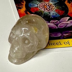 Quartz and Rhodonite Skulls